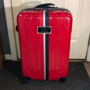 Tommy Hilfiger bright red hard case luggage